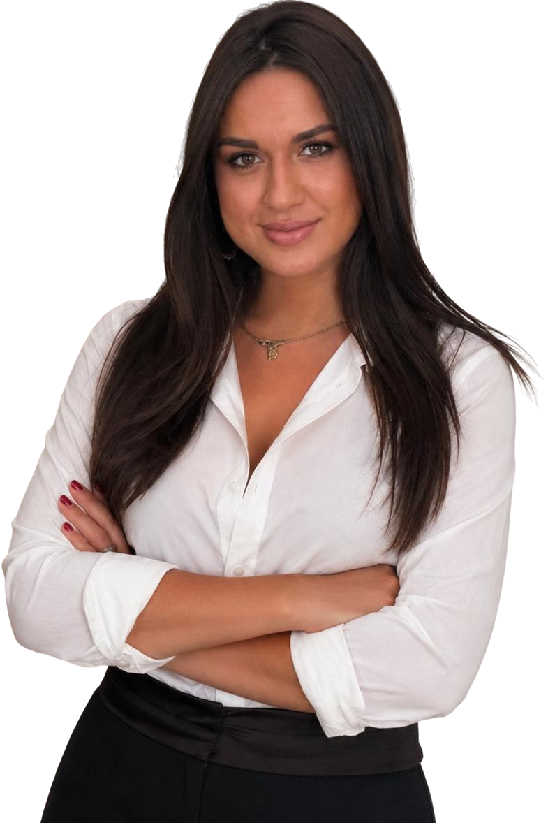 Professionally dressed woman with dark brown hair smiling confidently.